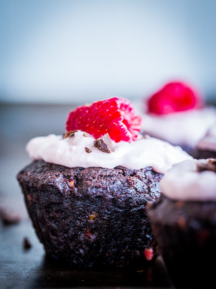 These Healthier Chocolate Cupcakes with Raspberries are made with healthy ingredients and packed with raspberries and beets to make the extra nutritious! They're also vegan, gluten free and refined sugar free! Perfect for dessert and great to bring to parties!