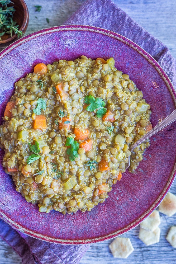 This Curried Lentil Quinoa Soup is so hearty and filing! It's made super flavorful with the curry powder and perfect for a comforting dinner or lunch! Naturally gluten free and vegan!