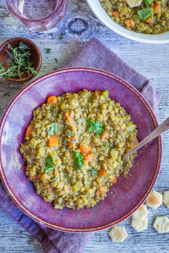 This Curried Lentil Quinoa Soup is so hearty and filing! It's made super flavorful with the curry powder and perfect for a comforting dinner or lunch! Naturally gluten free and vegan!