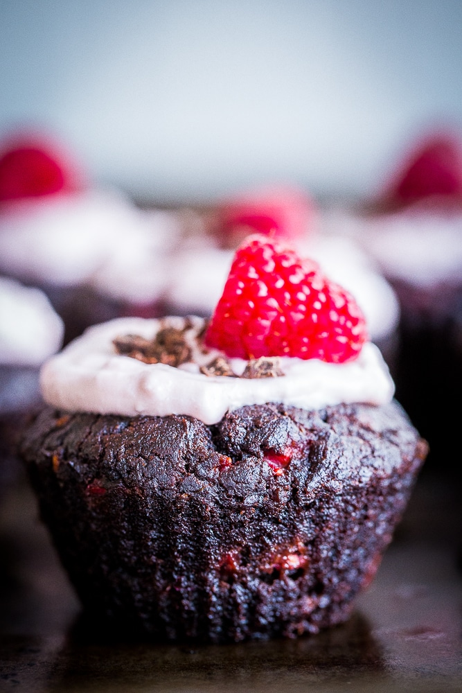 These Healthier Chocolate Cupcakes with Raspberries are made with healthy ingredients and packed with raspberries and beets to make the extra nutritious! They're also vegan, gluten free and refined sugar free! Perfect for dessert and great to bring to parties!