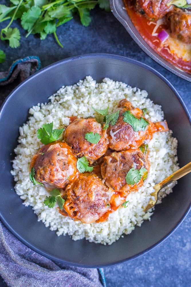 This Sweet Potato & Black Bean Vegetarian Meatball Enchilada Bake is such a delicious and comforting Mexican inspired dinner! It's gluten free and vegetarian and perfect for a dinner your whole family will love!