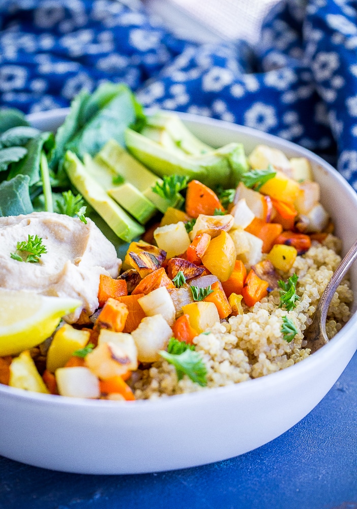 These Roasted Root Vegetable Buddha Bowls are packed with veggies and protein making them a healthy and filling lunch or dinner! Easy to make and great for meal prep! They're also gluten free and vegan!