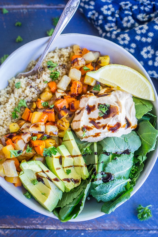 These Roasted Root Vegetable Buddha Bowls are packed with veggies and protein making them a healthy and filling lunch or dinner! Easy to make and great for meal prep! They're also gluten free and vegan!