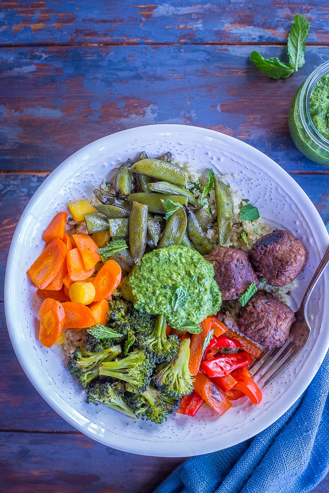 These Spring Vegetable and Meatball Bowls with Pesto are fresh, flavorful and filling! They're perfect for a quick, easy and healthy dinner or a meal prep lunch! They have all the delicious flavors of spring combined with the coziness of winter! A delicious #MeatlessMonday meal that the whole family will love!