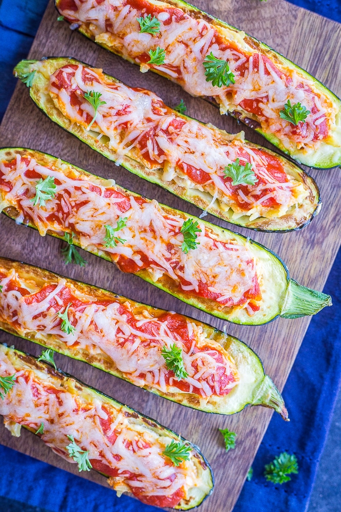 Lasagna Zucchini Boats with Orzo laying on a cutting board