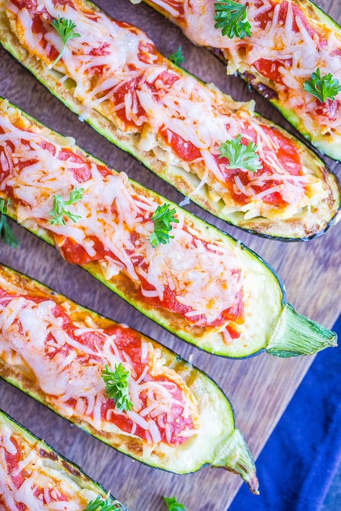 Lasagna Zucchini Boats with Orzo laying on a cutting board