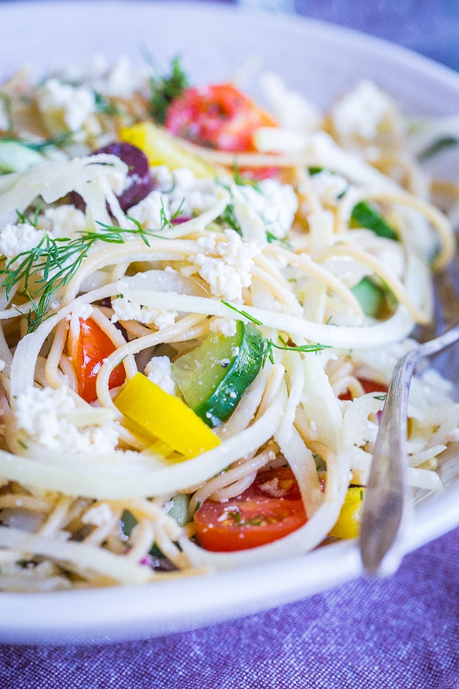The front view of a bowl of Healthy Greek Pasta Salad with Kohlrabi Noodles