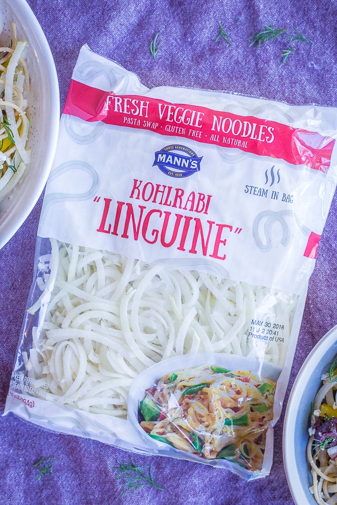 A bag of kohlrabi linguine noodles on a purple napkin