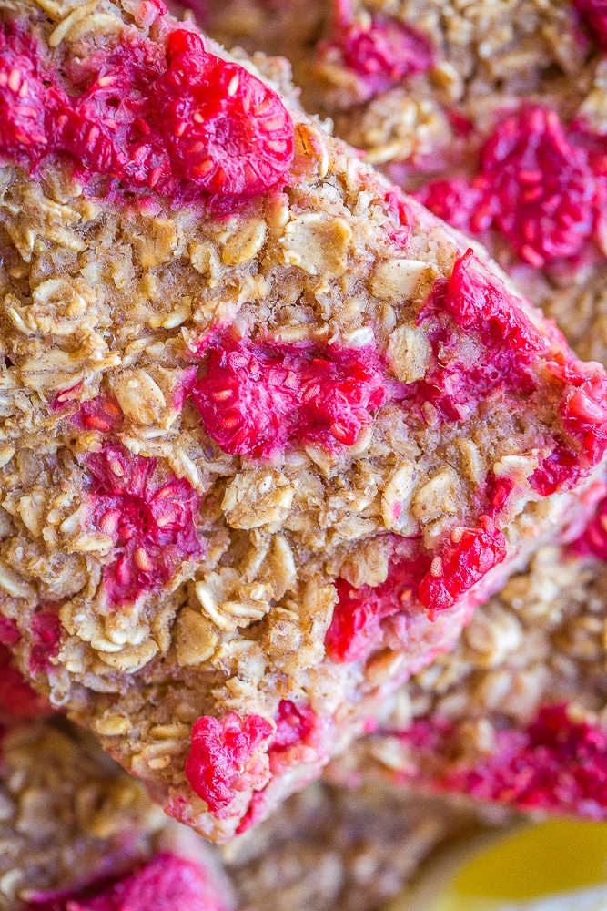 A close up of a piece of Lemon Raspberry Baked Oatmeal