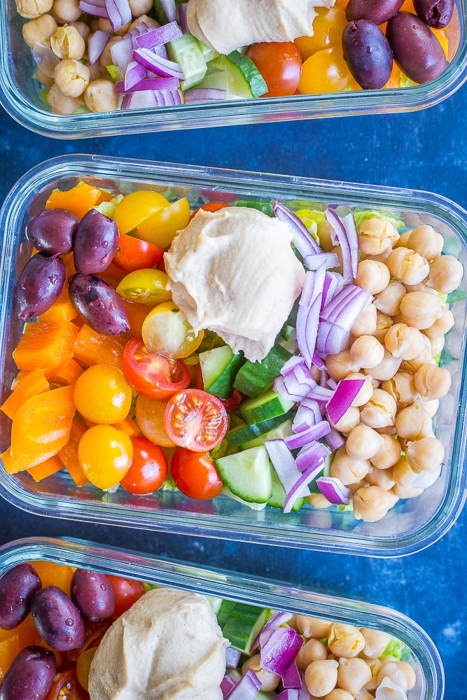 Three containers of Easy Greek Salad Meal Prep Bowls