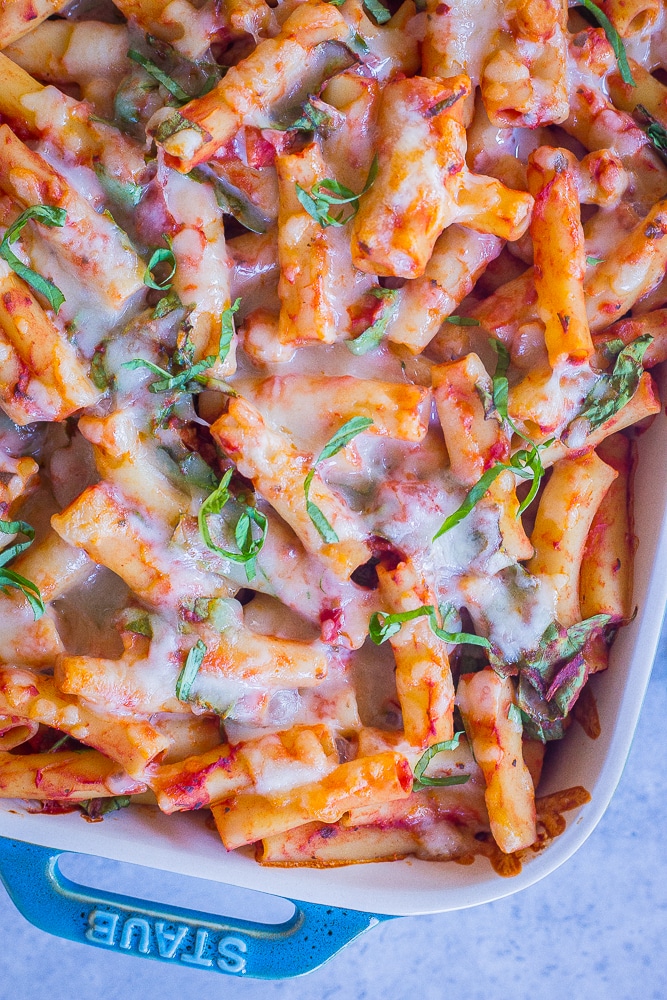 A closeup of a pan of 5 Ingredient Baked Ziti with Spinach and Chickpeas