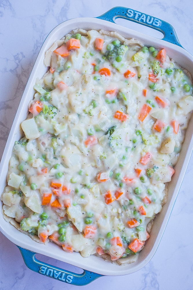 Creamy Vegan Pot Pie in a baking dish before being baked with no top crust
