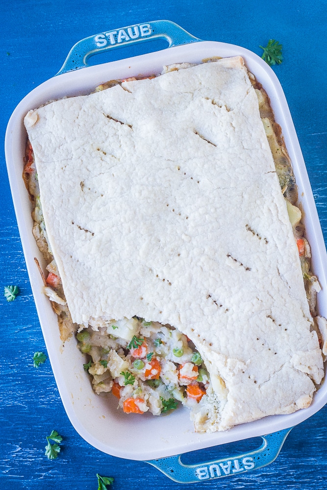 Overhead shot of Creamy Vegan Pot Pie with a spoonful taken out of it