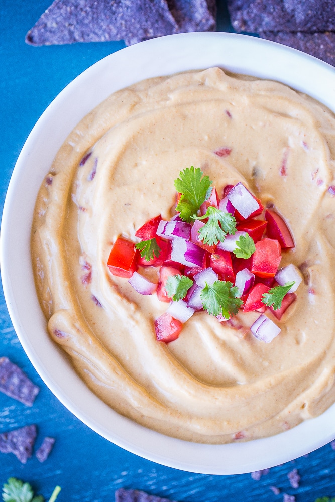 Close up of a bowl of Creamy Cauliflower Queso Dip