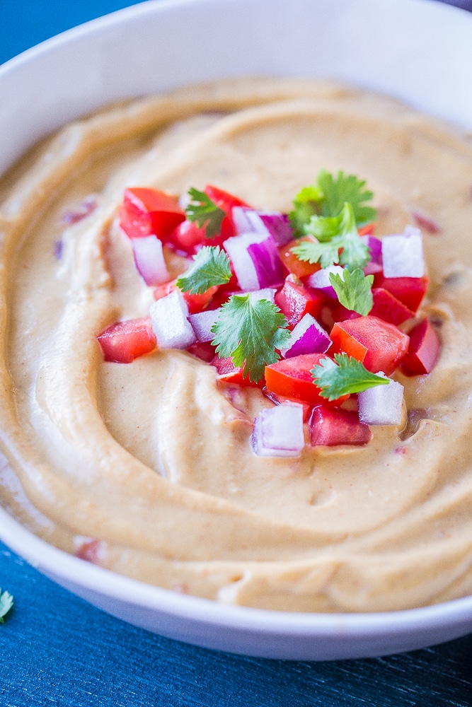 Close up of a bowl of Creamy Cauliflower Queso Dip