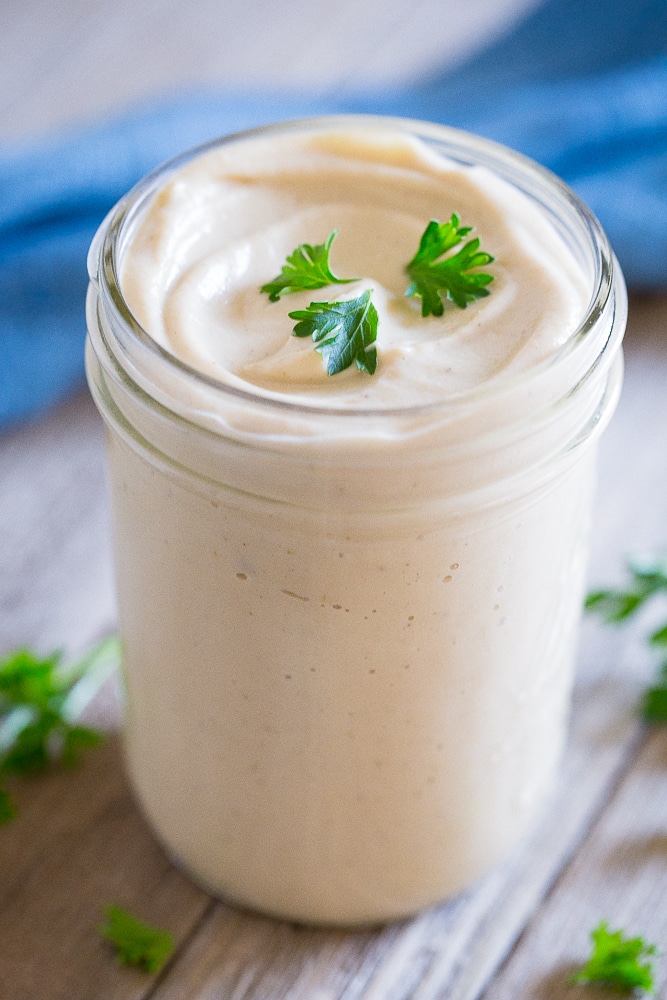 Jar of cauliflower Alfredo sauce for Vegan Alfredo Pasta with Crispy Chickpeas