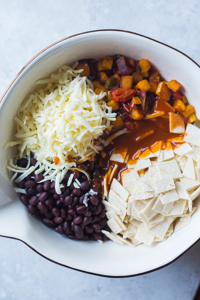 A bowl of ingredients for Black Bean Enchilada Casserole with Butternut Squash