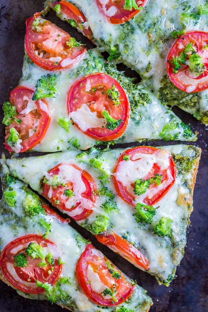 30 Minute Vegetarian French Bread Pizzas with Pesto on a sheet pan in slices