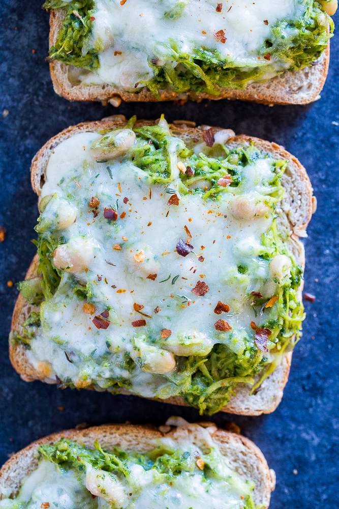 Spaghetti Squash Melts with Pesto and White Beans on a tray