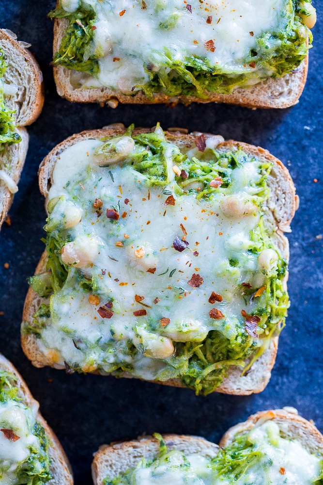 Spaghetti Squash Melts with Pesto and White Beans on a tray