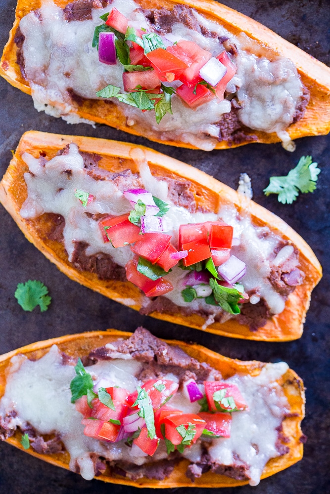 Sweet potato tostadas on a baking sheet