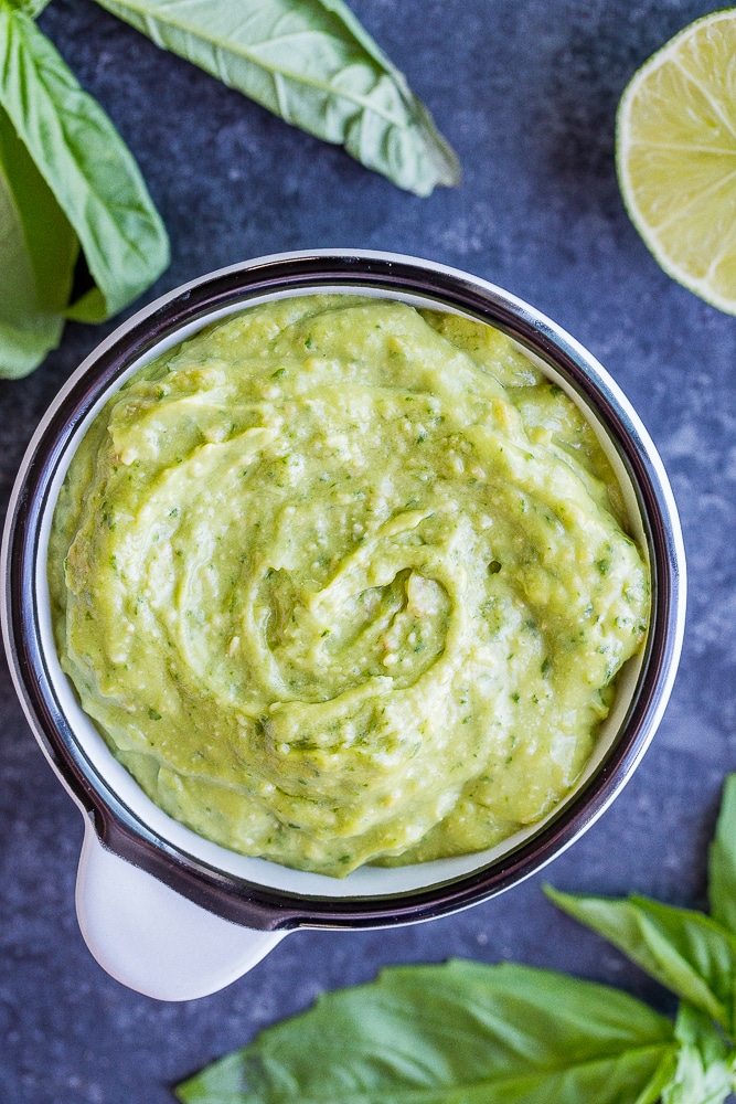 a bowl of Avocado Pesto for topping the zucchini noodles with