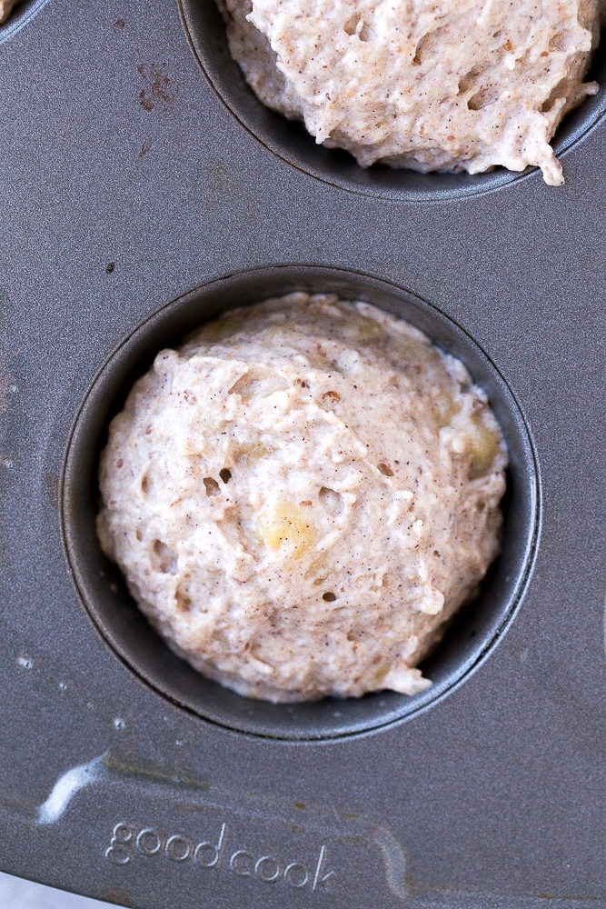 Healthy Banana Muffin batter in the muffin tin