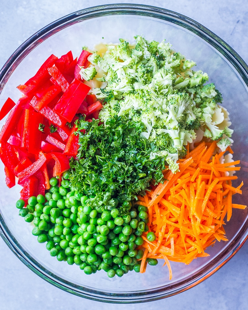 All the vegetables in a bowl for this healthy Primavera Pasta Salad
