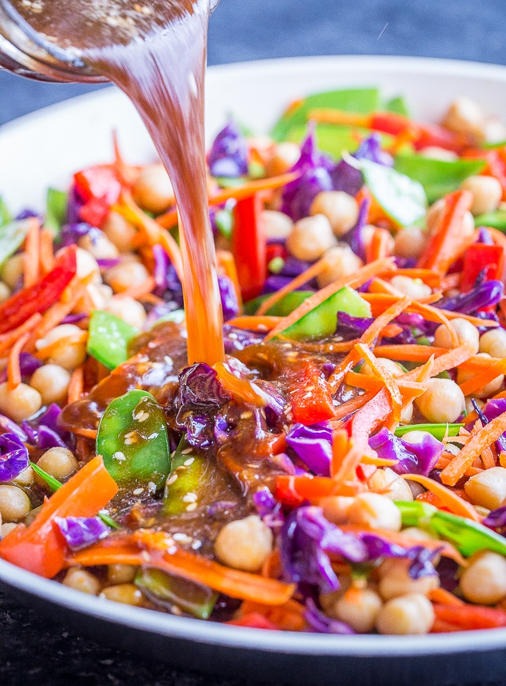 Sauce being poured over this healthy vegetarian stir fry recipe