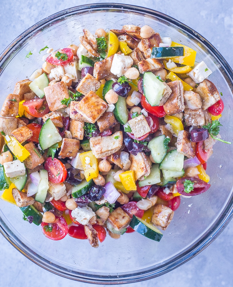 A big bowl of Greek Chopped Salad with Crispy Pita