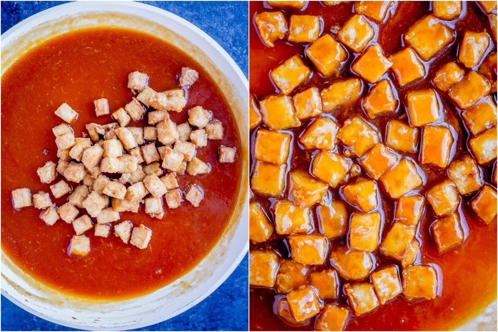 Crispy Tofu being tossed with an orange stir fry sauce