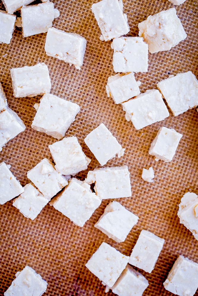Crispy Tofu raw on a baking sheet