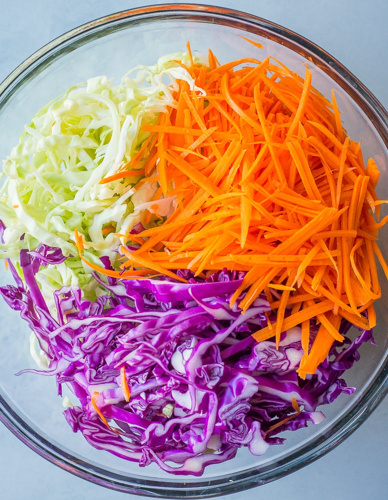 Cabbage and carrots in a bowl for easy homemade coleslaw