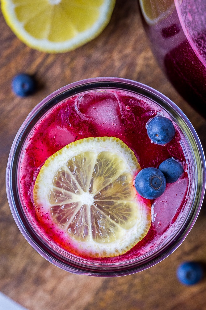 Homemade Blueberry Lemonade Recipe in a mason jar with ice