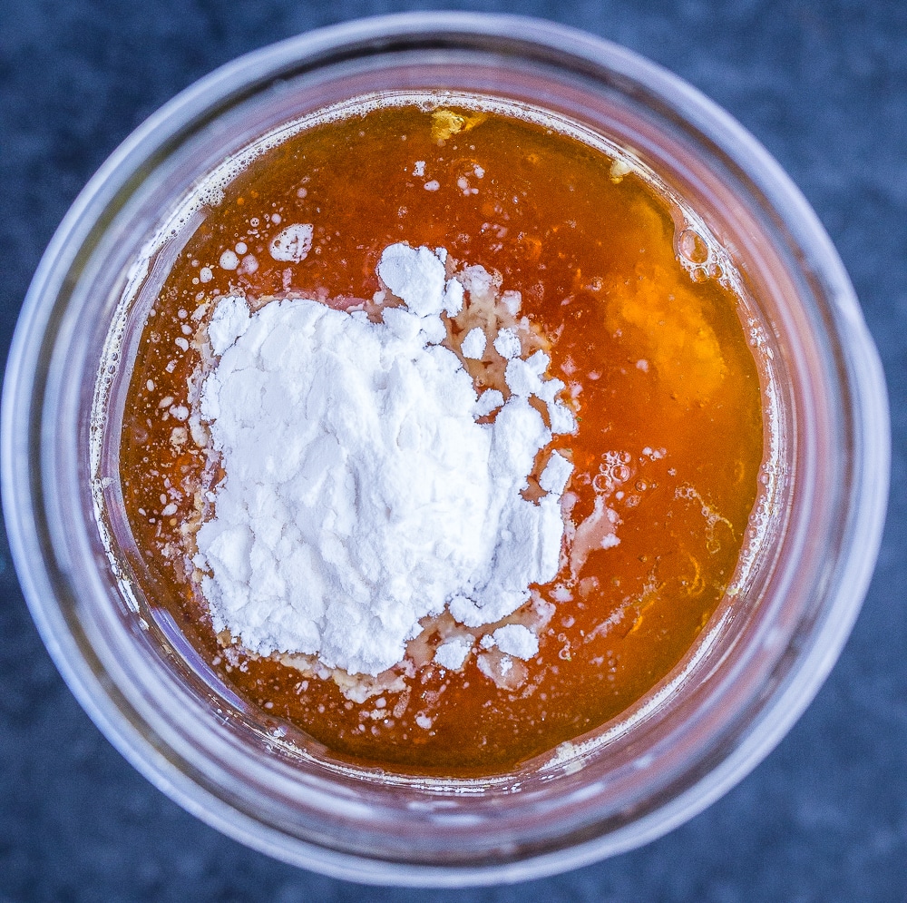 orange sauce recipe ingredients in a jar