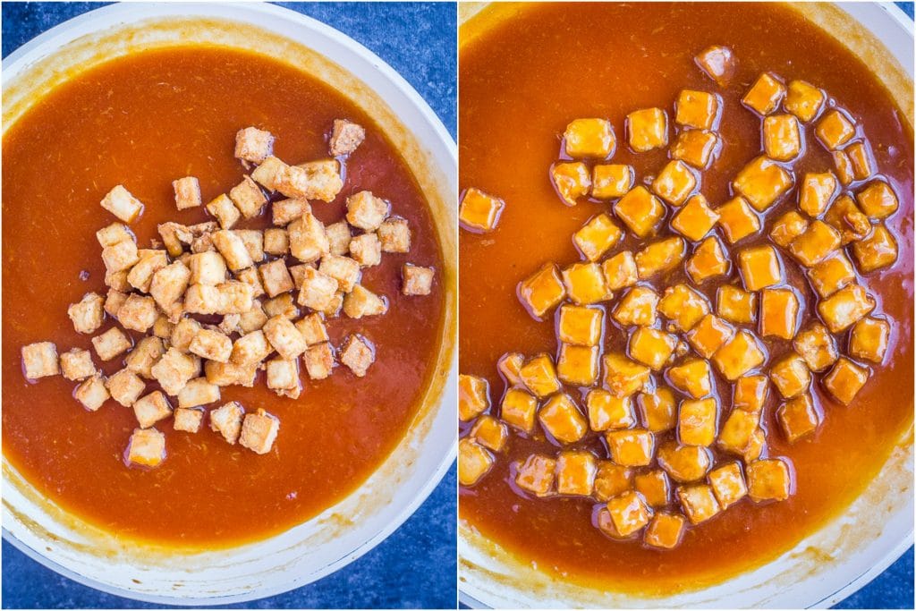 Tofu being mixed into the orange sauce for vegan orange tofu