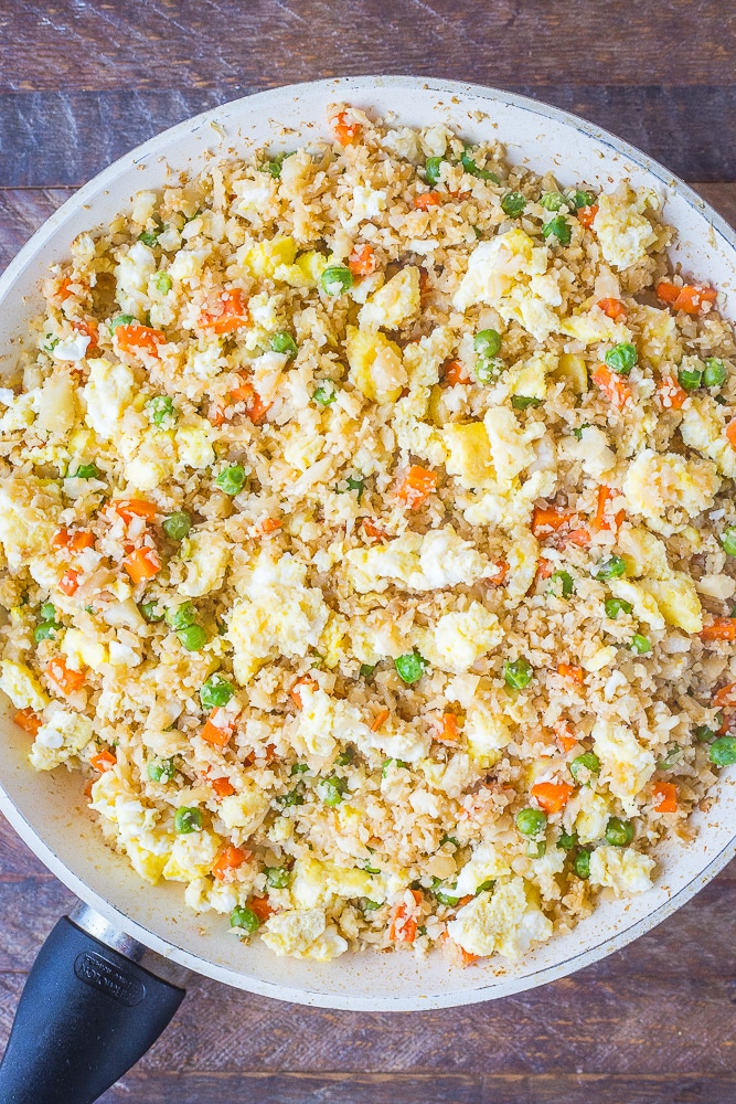 Large pan of cooked cauliflower fried rice
