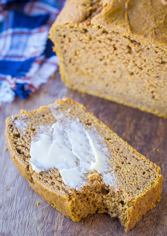 Slice of pumpkin bread with butter on it