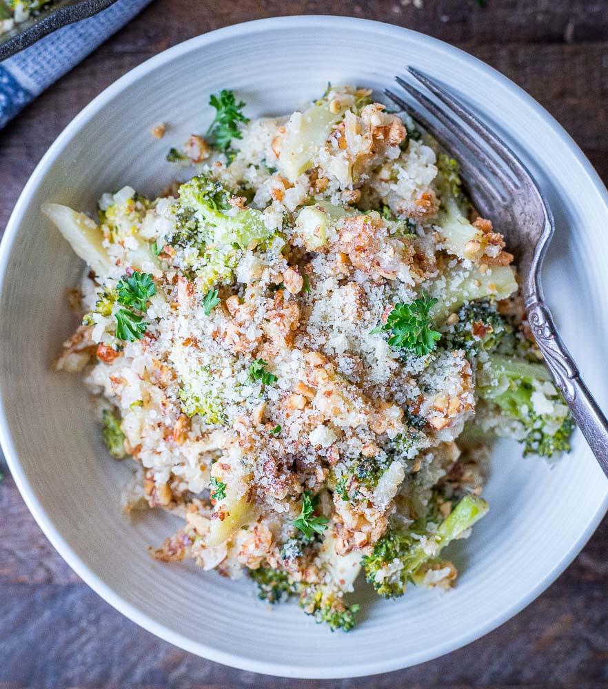Close up of broccoli cheese casserole recipe in a bowl