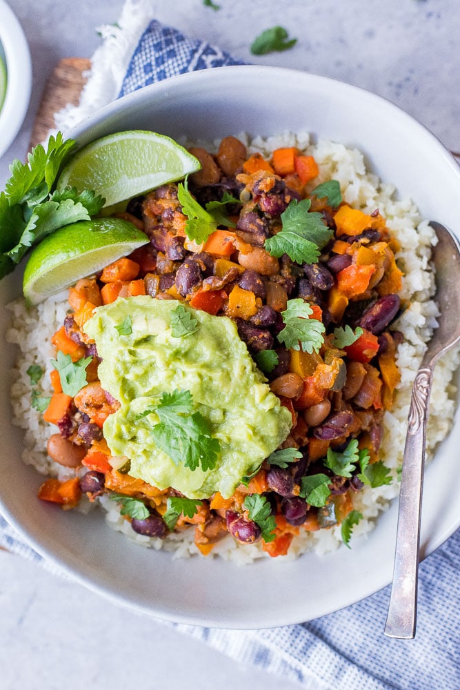 Big bowl of chili beans with toppings