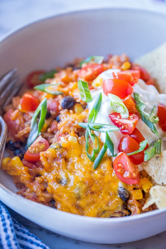 Closeup of enchilada rice casserole in a bowl