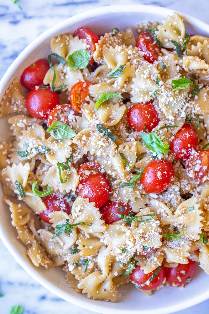 Close up of a bowl of bruschetta pasta salad