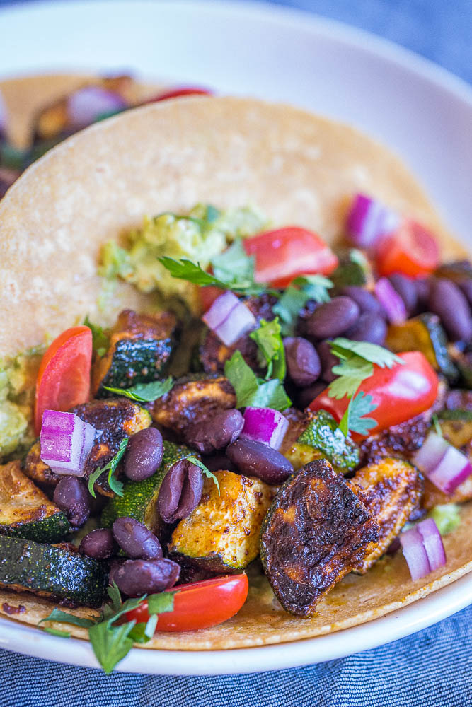 Close up of blackened zucchini in a taco