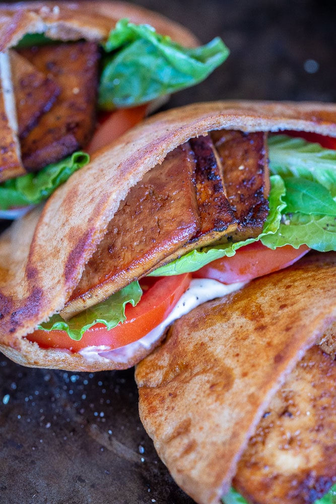 Close up shot of tofu bacon for these Vegan BLT Pitas