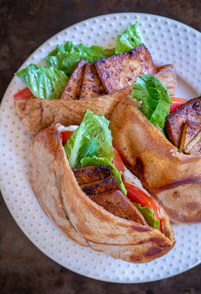 Close up shot of vegan BLTs on a plate