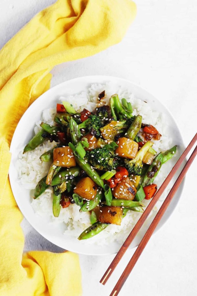 A plate full of food, with Salad and Teriyaki