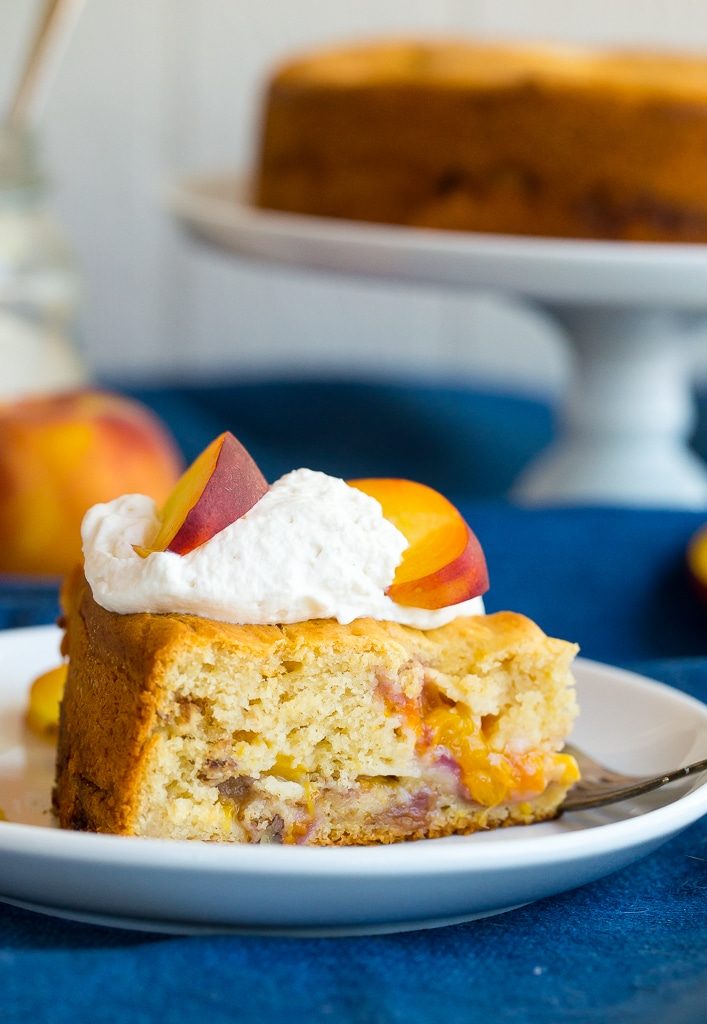 A close up of a plate of food on a table, with Cake