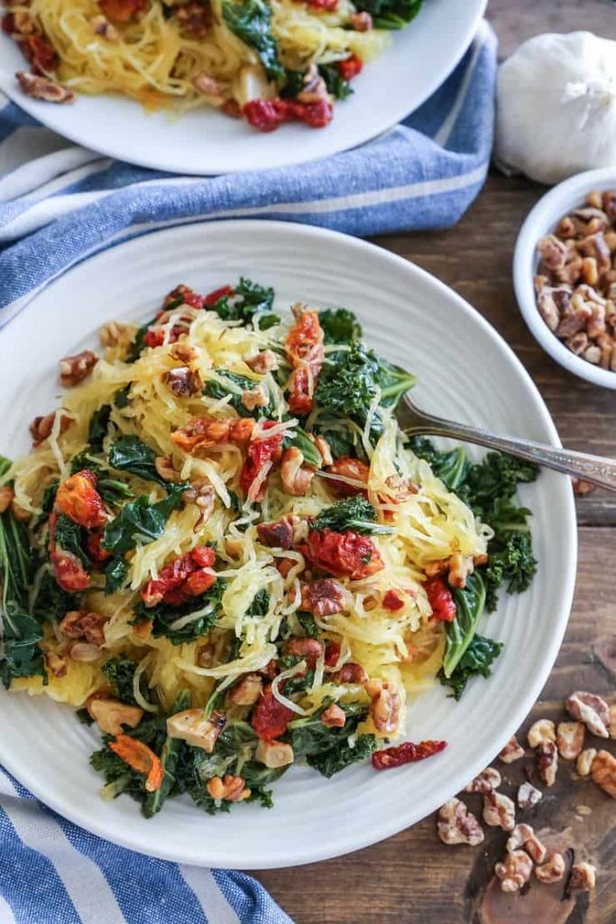 A plate of food on a table, with Spaghetti and Squash