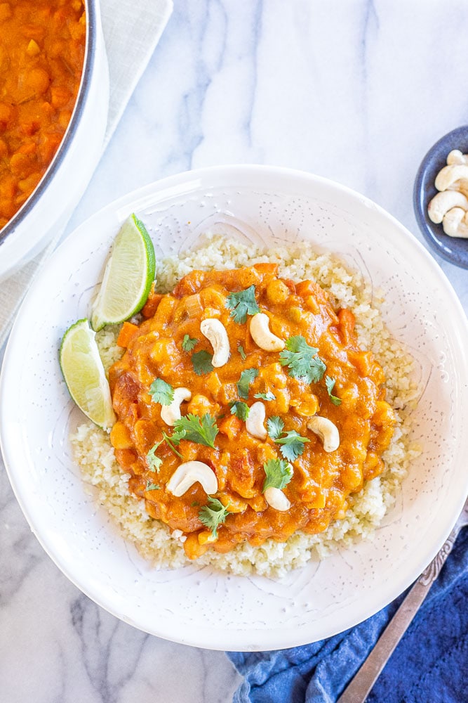 Flatlay photo of a bowl of pumpkin curry over cauliflower rice