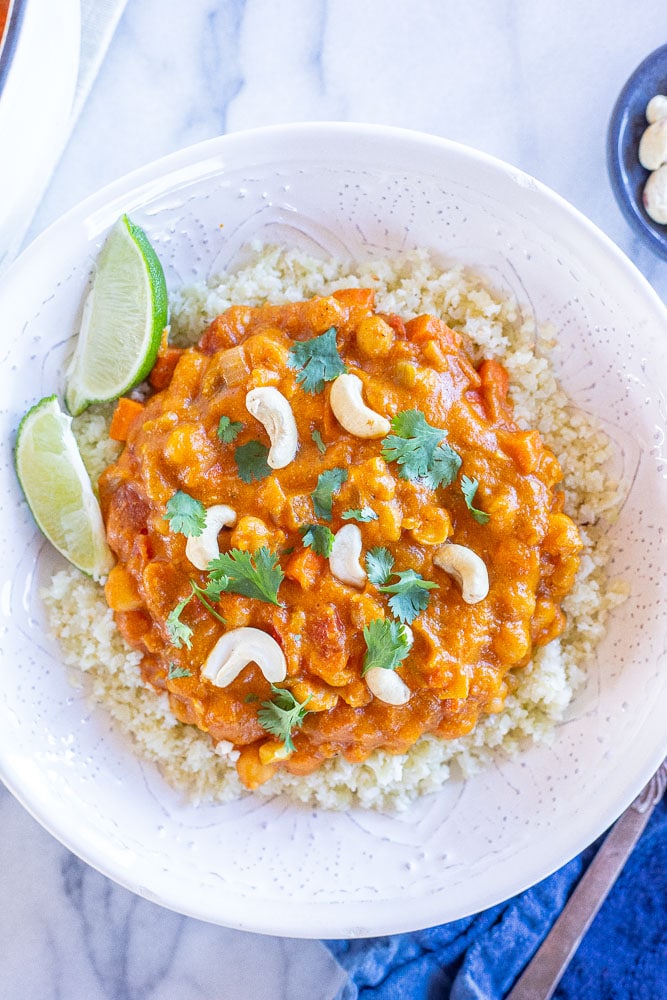 One pot pumpkin curry recipe in a bowl with toppings